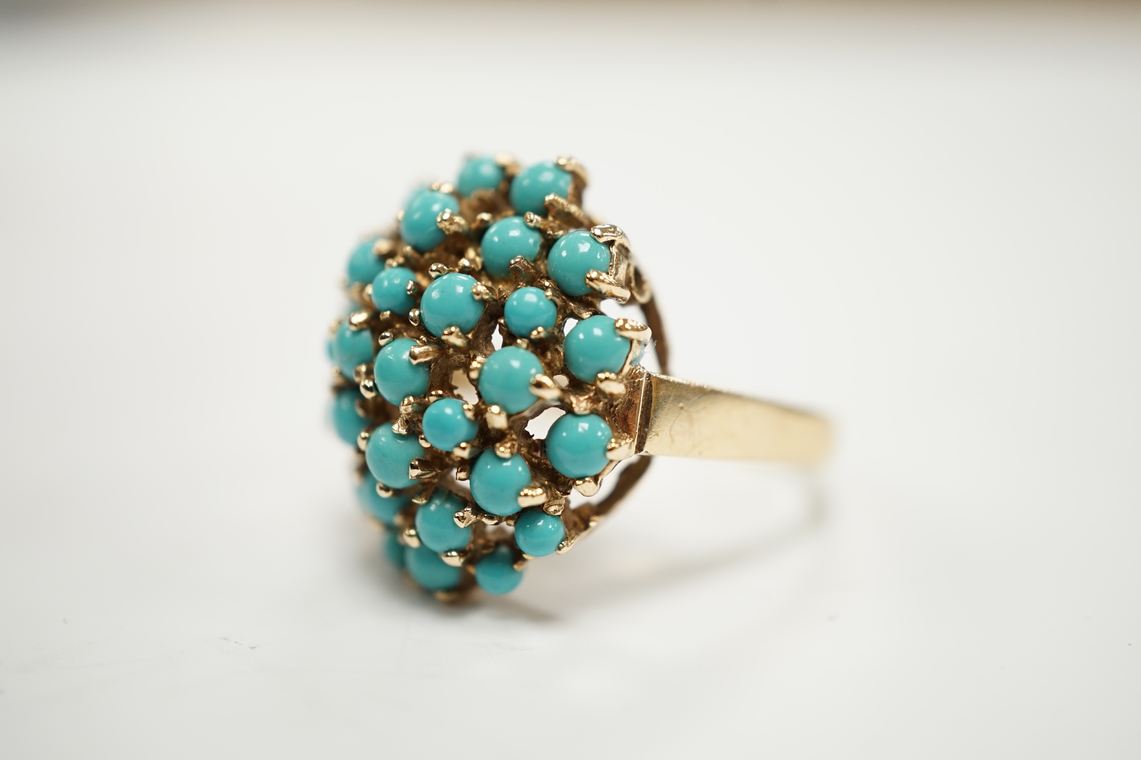 A 9ct gold and turquoise bead cluster set dress ring, size S, gross weight 6.3 grams.
